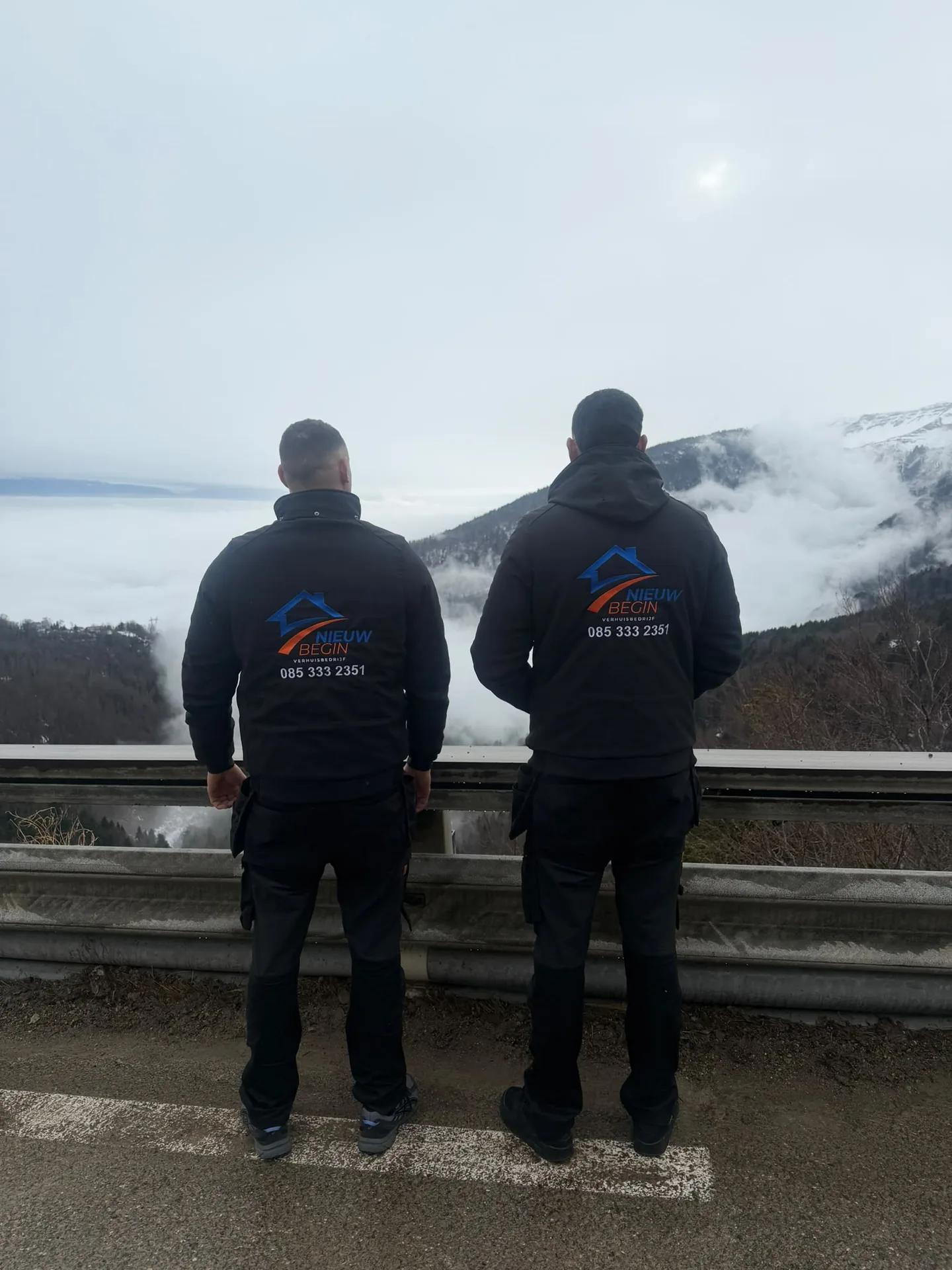 Two Nieuw Begin movers above the clouds, on the road abroad
